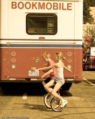 2 wheels, 2 kids and a bookmobile - Tom Frisch