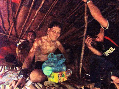 A visit to Jamalang Ringgut's hut in the afternoon. We brought him food, tobacco and a watch