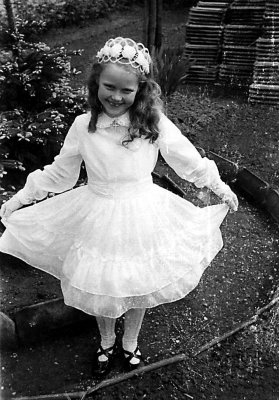 My Wife in first communion dress, 1955.