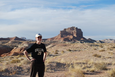 Janet in Goblin Valley, with her free T-shirt from the Dallas Stars game