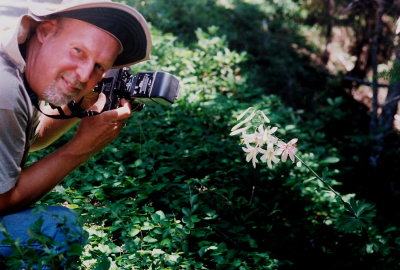  Ron Parsons pauses while photographing Lilium washingtonianum.  Onion Mt. CA  7/16/09