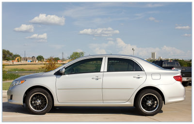 2009 Toyota Le with lip spoiler and side molding