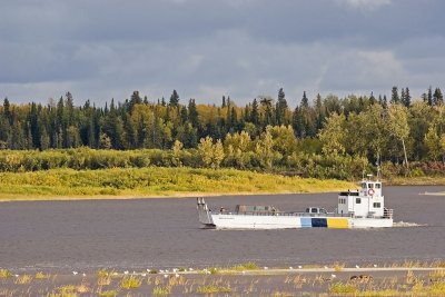 Barge Manitou II between sandbar and Charles Island