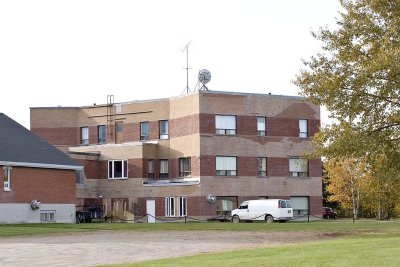 Former Catholic rectory from First Street in Moosonee