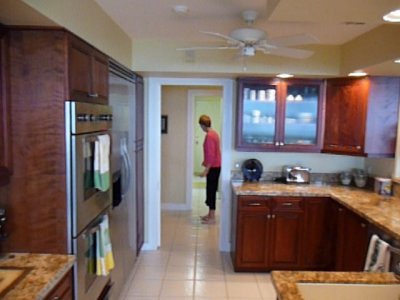 standing near breakfast area.  sheri's in the hall to the bedroom