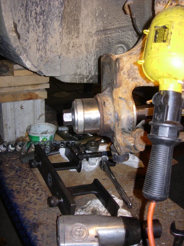 Sneaking the Bearing back in.JPG