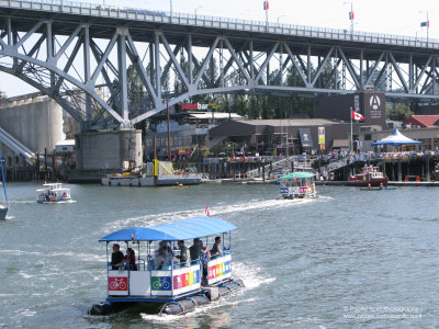 An Aquabus coming to a dock on the north shore of False Creek