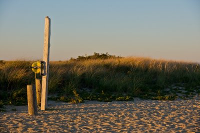 Evening beach with post and rope