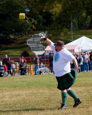 Large Man in Kilt Tossing a Heavy Object