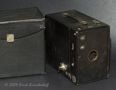 This is a No. 2A Brownie.  Given its features eyelets around the lens and finder windows, but no indications that it is a Model B on the stampings on the interior metal parts), I believe it was made between 1909 and 1911.  http://www.brownie-camera.com/56.shtml