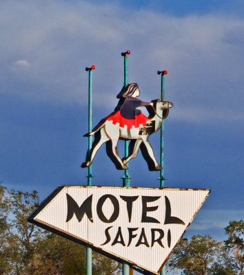 A closeup of the Safari Motel sign