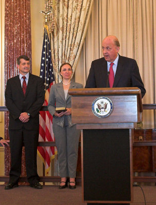 Secretary Negroponte does the honors