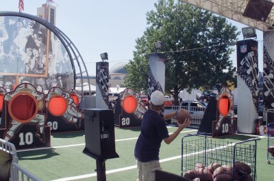 Kids Competing in a Free Contest surrounded by Trucks