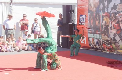Chinese Acrobats -yes she is bent over double-photo lightened to make clearer