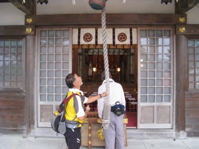 Jay and Geno paying their respects at a local shrine in Hayakita