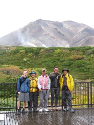 Us before the arduious hike around the active volcano.