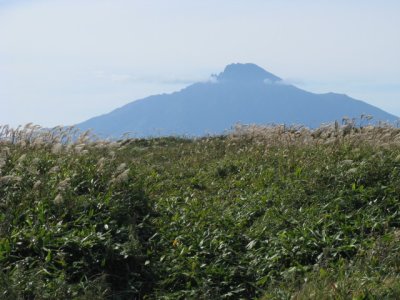 There's a headwind most of today. Mt. Rishirifuji still looms offshore as we ride south down the west coast of Hokkaido.