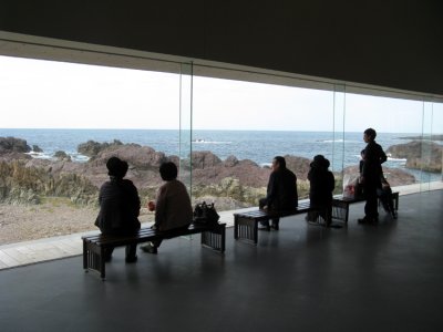 Visitors enjoying the coastal view at the aquarium.
