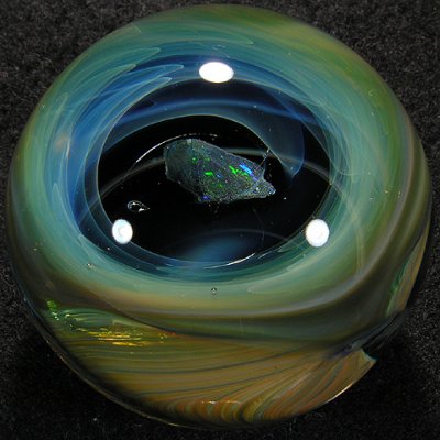A nice big 'black opal' is suspended above this vortex, getting sucked below...