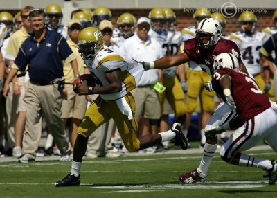 Georgia Tech QB Nesbitt attempts to pull away from Mississippi St. LB Wright