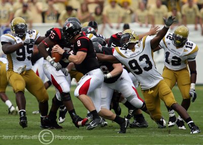 Georgia Tech DE Johnson flushes Bulldogs QB Stan Doolittle out of the pocket