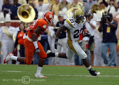 Yellow Jackets B-back Dwyer turns the corner on Tigers CB Crezdon Butler on his way to a 31 yard gain to set up a score