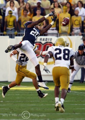 Cavaliers WR Ogletree leaps for a pass that is just out of his reach
