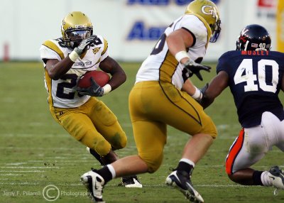 Georgia Tech A-back Jones takes advantage of a teammates block to gain additional yardage