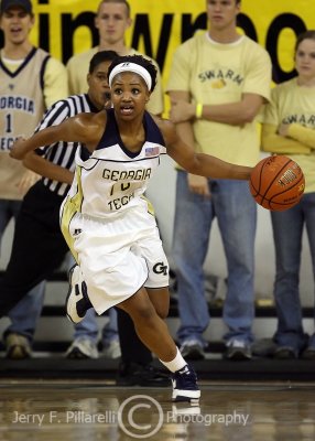 Tech G Shaday Woolcock drives the ball up court