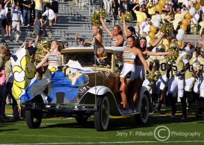 Yellow Jackets Ramblin’ Wreck leads the team onto the field