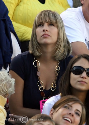 Georgia Tech Yellow Jackets fan checks the scoreboard