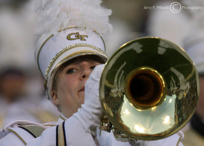 GT Yellow Jackets band member plays during halftime