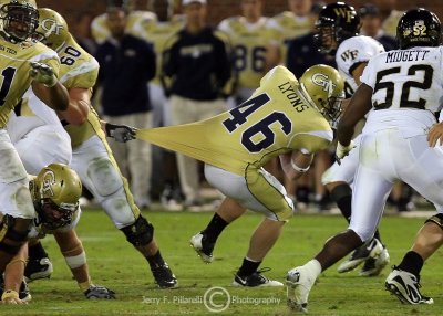 Yellow Jackets B-back Lyons stretches for every available yard