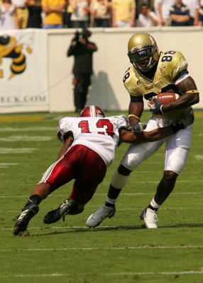 WR Chris Dunlap side steps a Troy defender