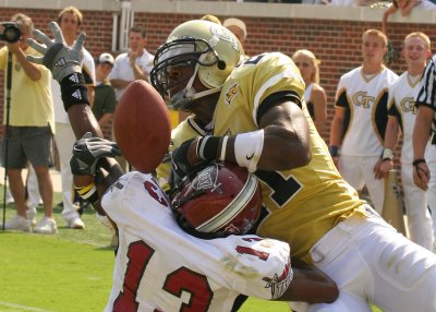 WR Calvin Johnson is denied by a Troy defender