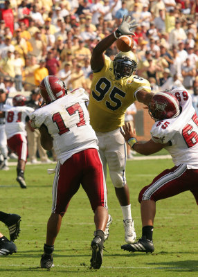 DT Darryl Richard deflects a Omar Haugabook pass