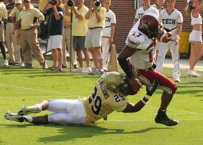 S Sam Williams stops Troy QB Omar Haugabook short of a TD