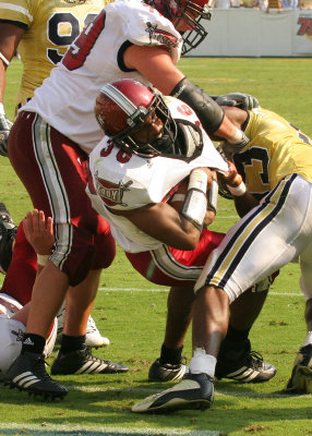 Troy RB Anthony Jones strains to score a 4th quarter TD
