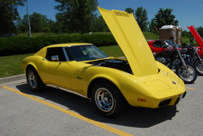 Beautiful offering. This yellow Vette was in the car show in Parkville Missouri. I didn't get near as many pictures of this car as I would have liked. It was ninety degrees outside & my girls were hot & cranky.