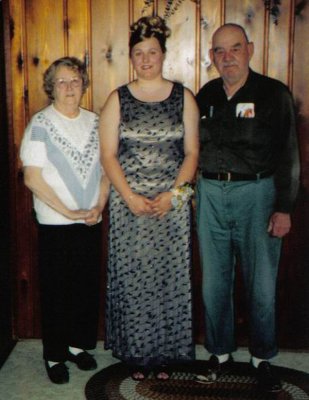 Shown above is Salena Marie Robinson with her paternal granbdparents, on the night of her Sr. prom. Salena Marie Robinson is the daughter of, David Arthur Robinson & his wife, Lois Marie [St. Clair] Robinson. Shown above, left to right is, Lucille Alena [Mattson] Robinson, Salena Marie Robinson, and her grandfather, Harold Everette Robinson. 