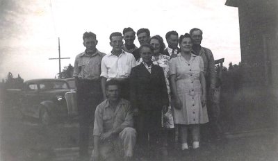 Left to right, back row we see: William Robert, Nelson Walter, Leon August, Newton Stephen, & Austin Newton, St. Clair. Second row left to right we see: Cecil Hiram in the white shirt, Vera Constance [Marks], Lela Mae, Carl Richard, (kneeling) & Lyle Rolland, St. Clair. This photograph was given to us by, Lyle Rolland St. Clair. This is a treasured artifact of Leon's granddaughter, as she'd never before seen a picture of her grandfather as a young man. Thank you Lyle.  
