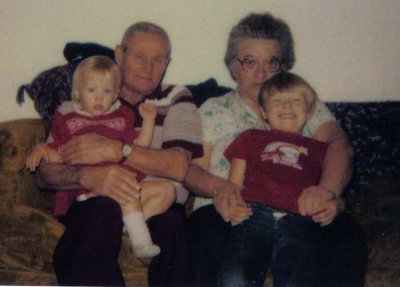 Grandma & grandpa St. Clair, with two of their grandchildren. Again, Salena Marie Robinson and her brother, David Arthur Robinson Jr.