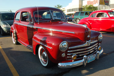 If anyone can identify the exact year on this cool old Ford, I'm open to suggestions. Personally, I much prefer these old cars when they're restored to factory. What a beauty.