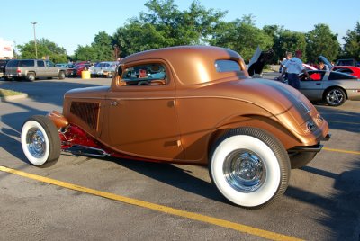 I hate the color, but the car was rockin cool. Those wide white wall tires made it look very 1950's Hot Rod style.