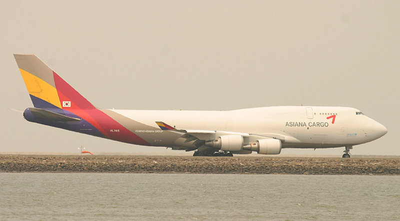 Asiana Cargo 747-400F taxi to its take off position in hazy SFO