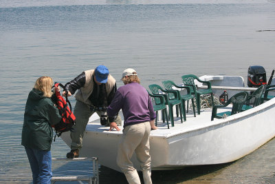 Andy Patterson helping people off of the skiff used to get us from his boat to the shore.  Bold Coast Charters was first rate.