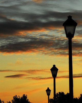 3 lights a sunset.