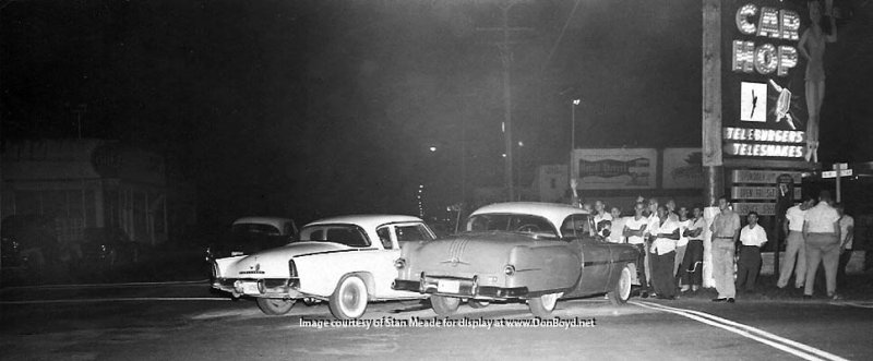 1950s - a 1956 Studebaker Hawk in a minor car wreck in front of the Car Hop Drive-In featuring Teleburgers and Teleshakes
