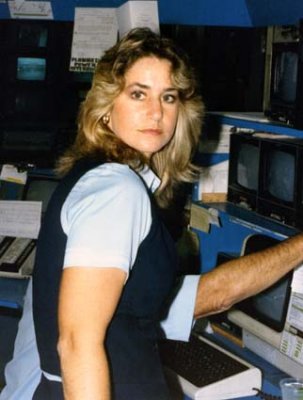 1980s - Airfield Operations Agent Vicki Purdy in the Gate Assignment Office at the E-Satellite
