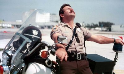 Late 1980s - MDPD motorman Al Papa sunbathing while deterring speeders on the ramp